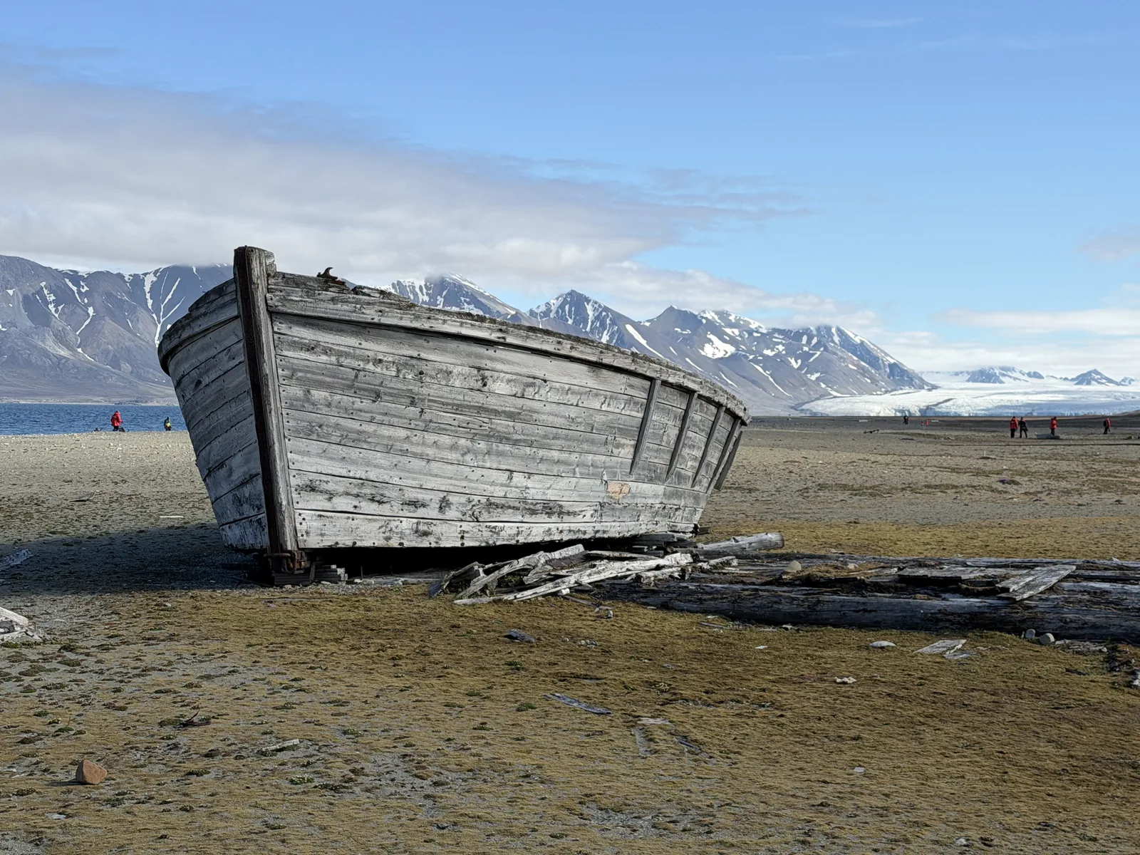 A wooden boat wreck on tundra