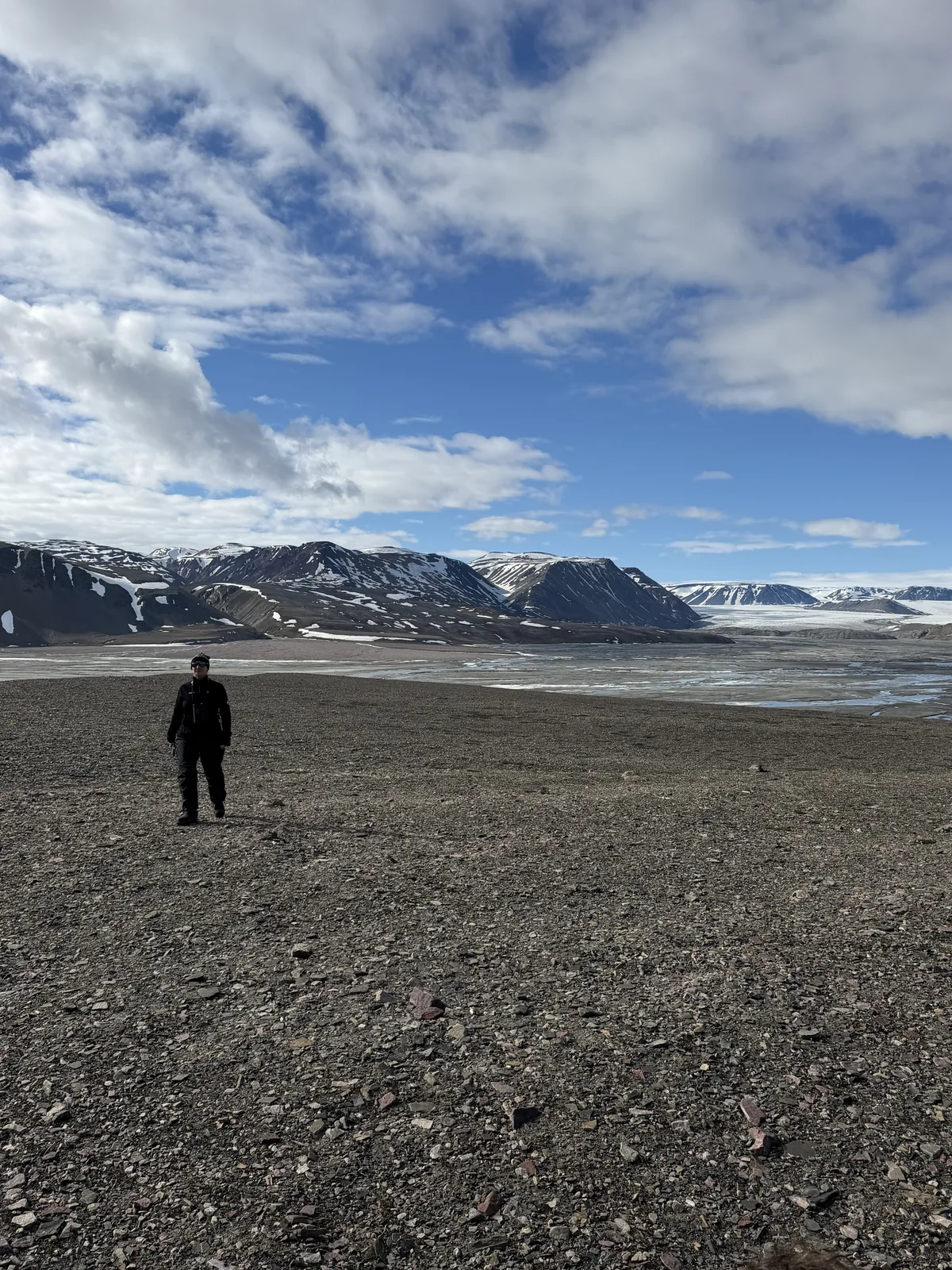 A lone figure in vast tundra